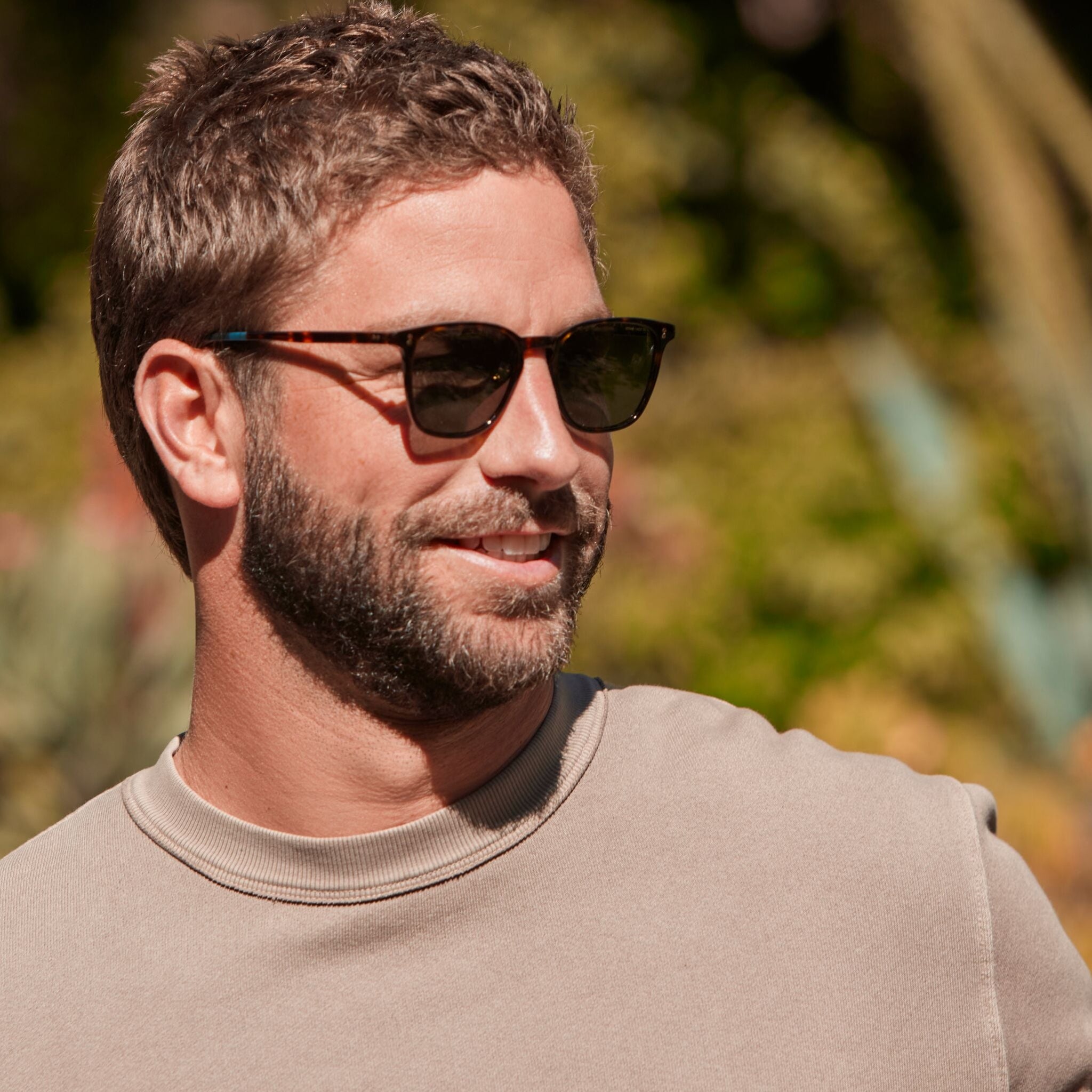 Unisex Emerson Handcrafted Sunglasses in Dark Tort frame with Bottle Green Polar Lenses model image