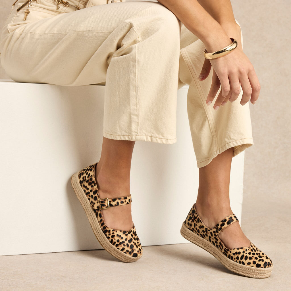 On model imaege of the Womens Carolina Mary Jane Espadrille Brown Sugar Leopard Print Hair