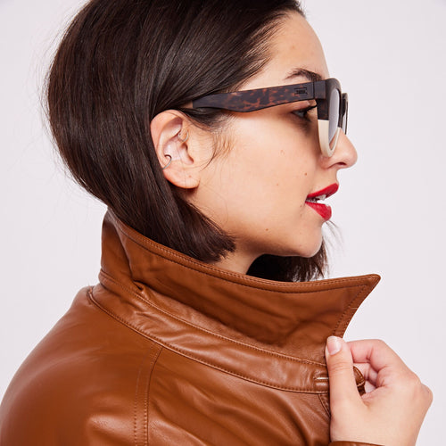 Women's Florentin Tortoise Oatmilk Fade Traveler Sunglasses on model image with side frame 