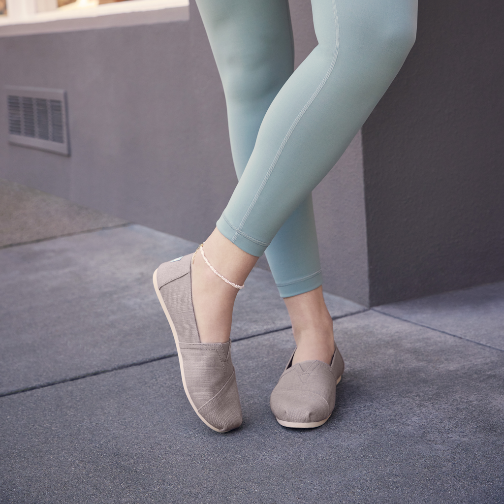 Alpargata In Morning Dove Grey On Model Standing In Yoga Pants