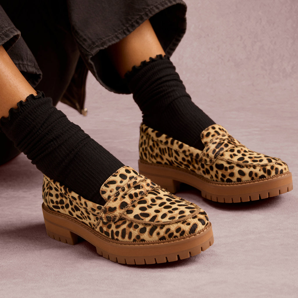 On model image of the Womens Cara Loafer Brown Sugar Leopard Print Hair Leather