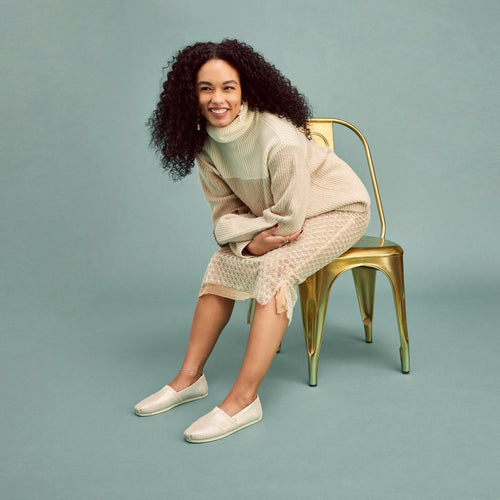 Lifestyle image of the champagne metallic suede Alpargata