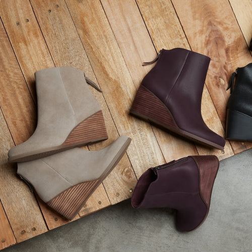 laydown image of the dune suede Casey ankle wedge boot