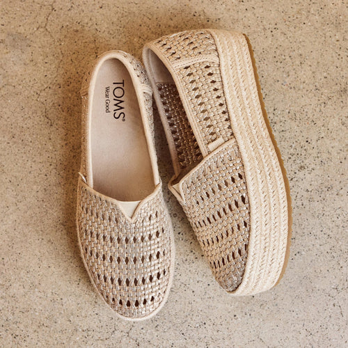 Laydown image of the champagne metallic basket weave Valencia Espadrille