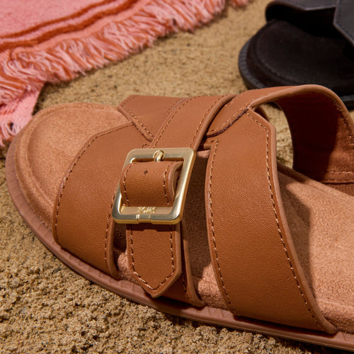 Up close detail image of the brown sugar Sol slide sandal