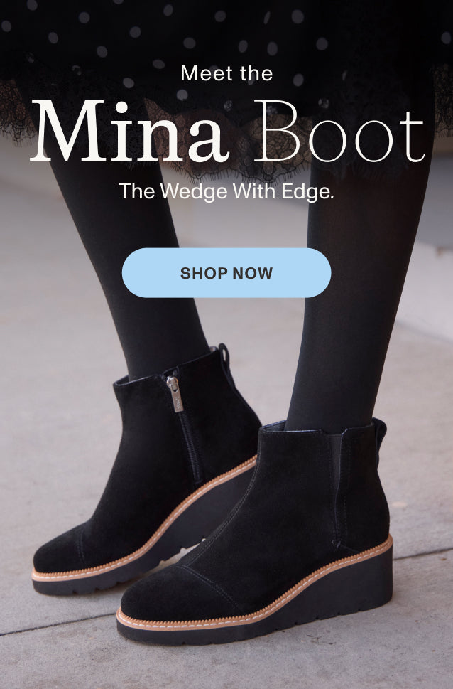 Meet the Mina Boot. The Wedge With Edge. SHOP NOW: Water Repellent Black Suede shown on model.