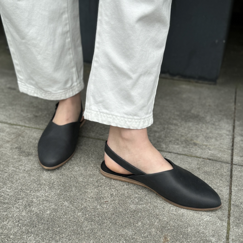 jade slingback in black on model up close detail shot