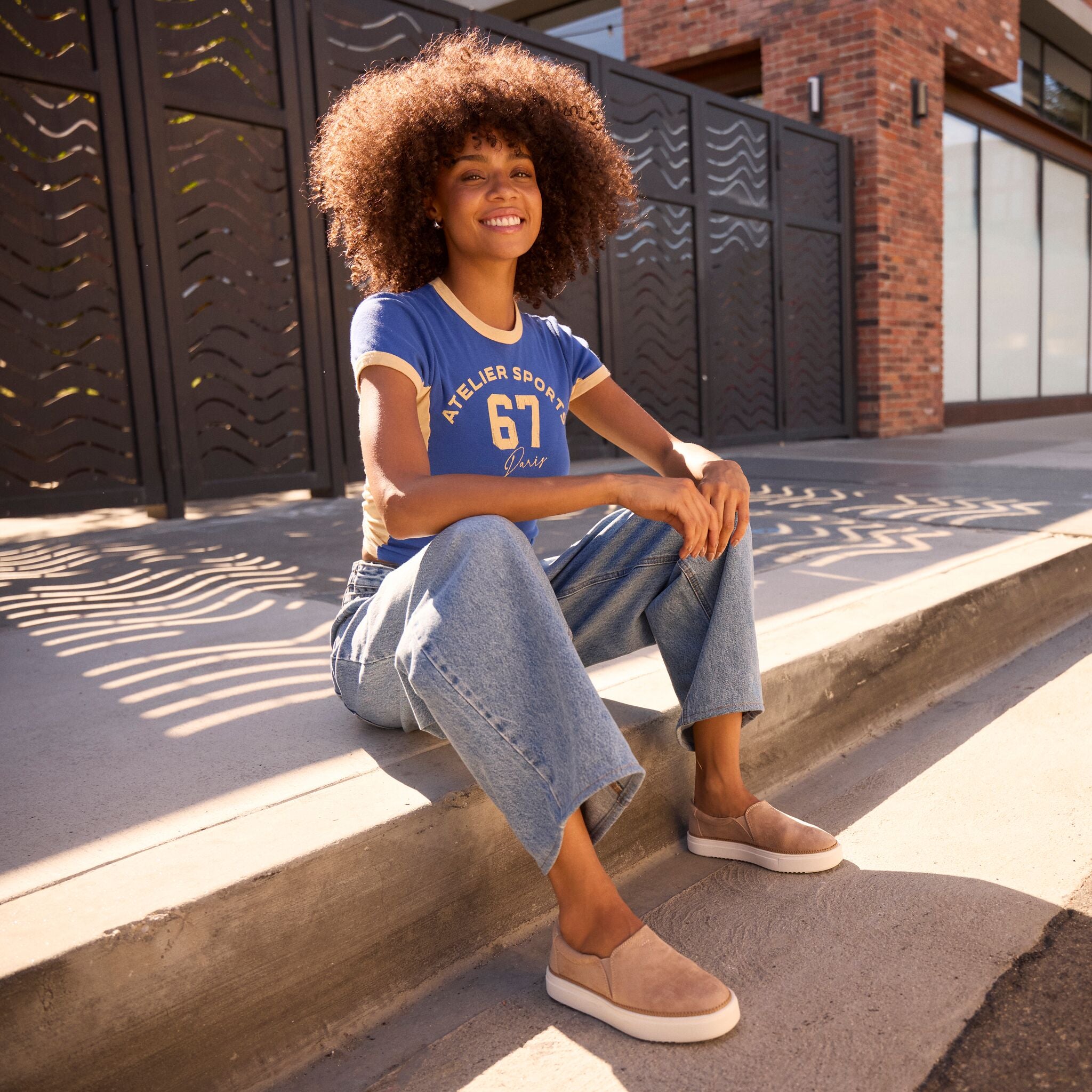 On model image of the Womens Emily Slip On Sneaker Taupe Premium Microfiber Suede