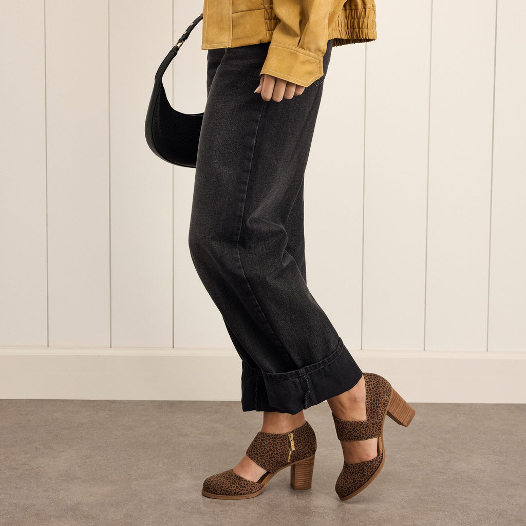 On model image of the toffee leopard Milan Nova heel