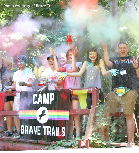 A youth group having fun at summer camp. Caption: photo courtesy of Brave Trails. 1/3 of profits for Grassroots Good.