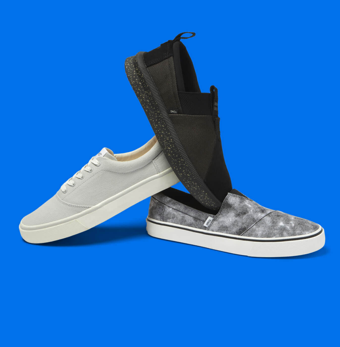 The Men's Black Slip On Repreve Fenix, the Men's Lunar Grey Alpargata Fenix Sneaker Shoe, and the Water Resistant Black Alpargata Rover shown.