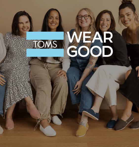 TOMS Wear Good logo on image of a group of people.