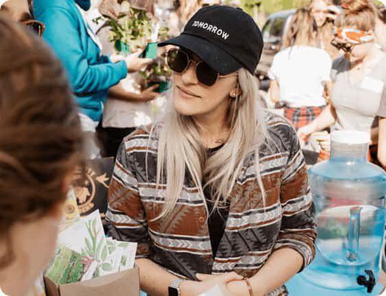TOMS employee at a Giving Tuesday event.