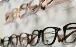 Eye glasses on a wall display.