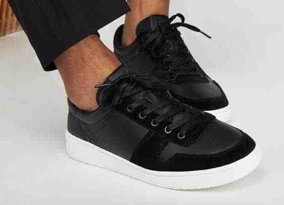 Men's TRVL LITE Court Black Leather Sneaker in black shown.