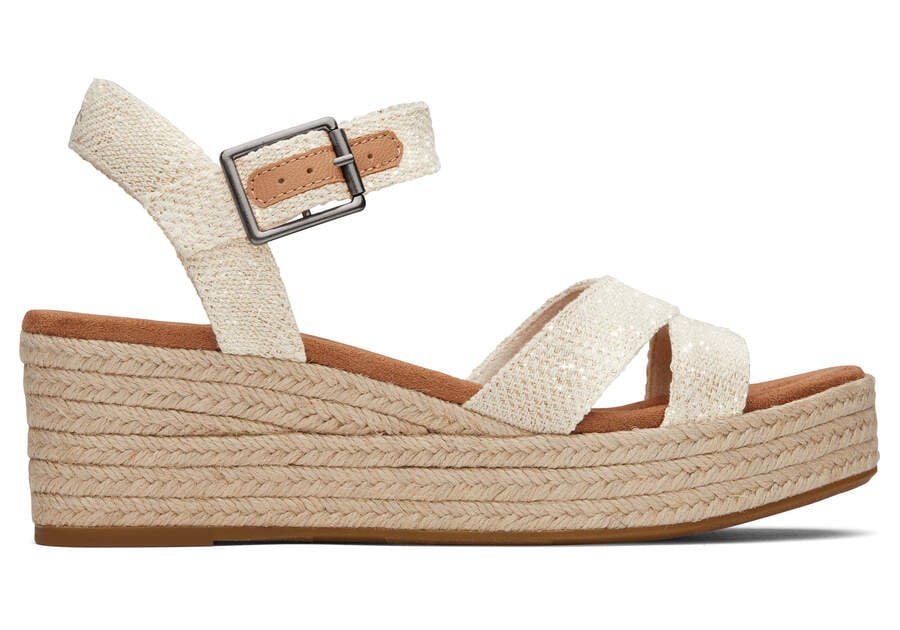 Audrey Natural Metallic Wedge Sandal Side View Opens in a modal