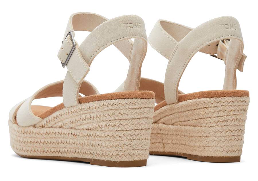 Audrey Cream Suede Wedge Sandal Back View Opens in a modal