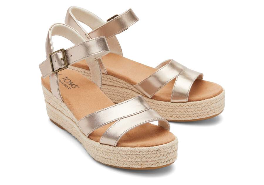 Audrey Gold Metallic Wedge Sandal Front View Opens in a modal