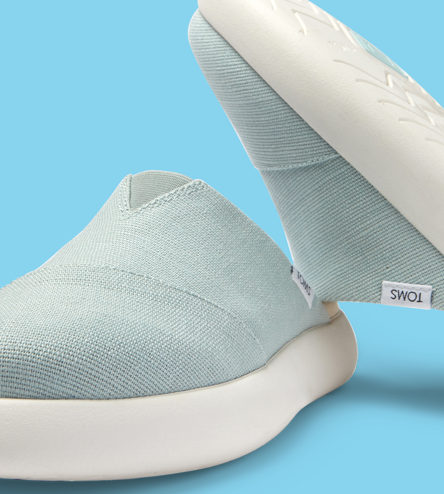 Close up of the front and side of the Alpargata Mallow Mule in Pastel Blue Heritage Canvas
